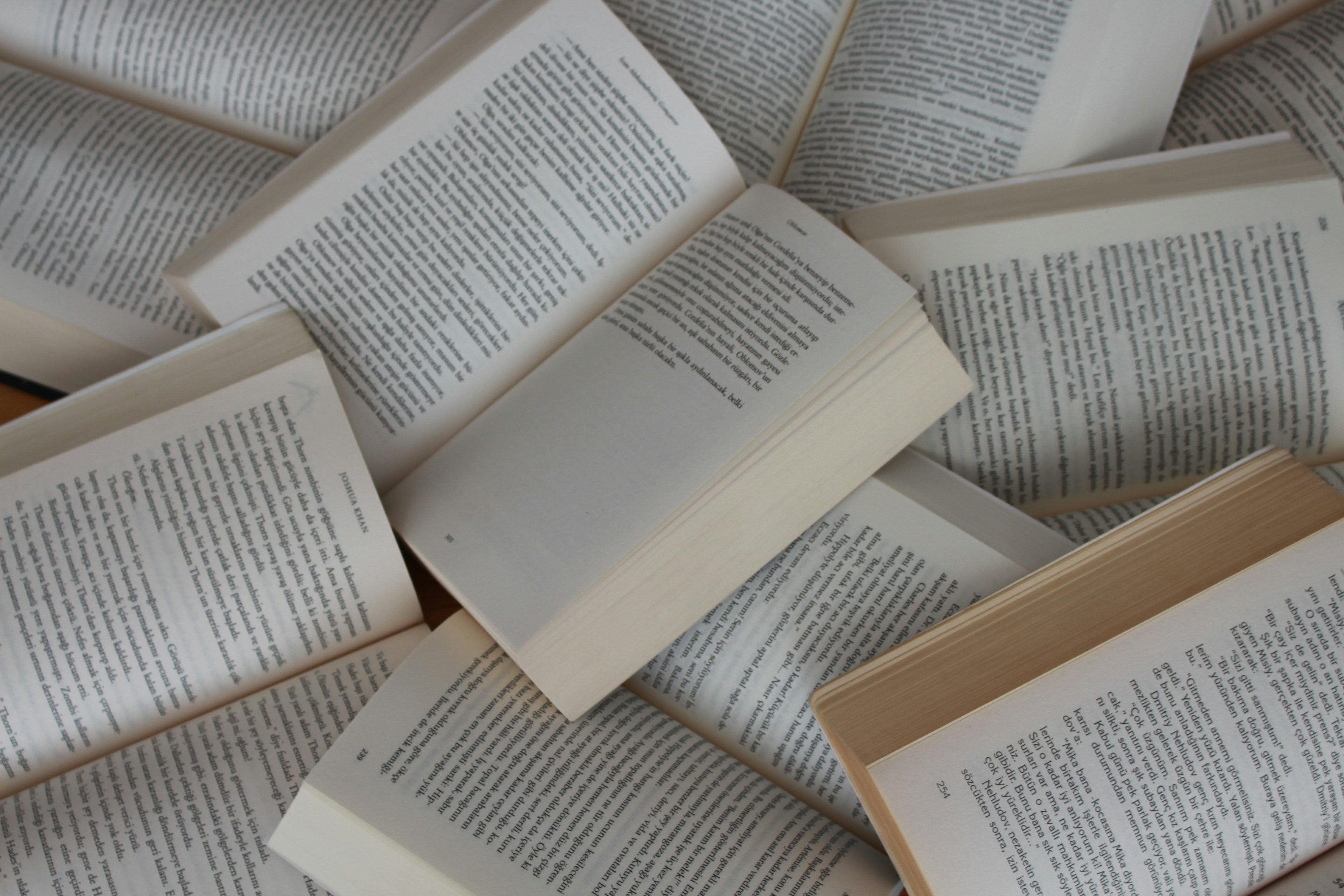 A pile of random open books