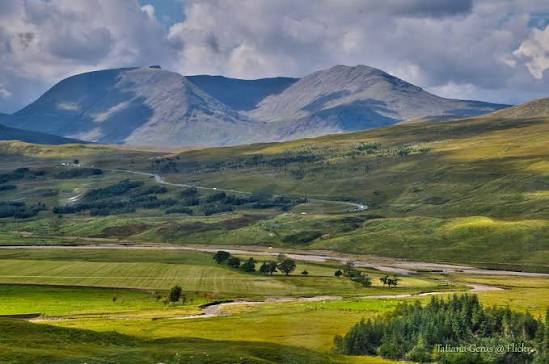 Snow capped Scotish Mountains and the greenary of the Scotish Highlands